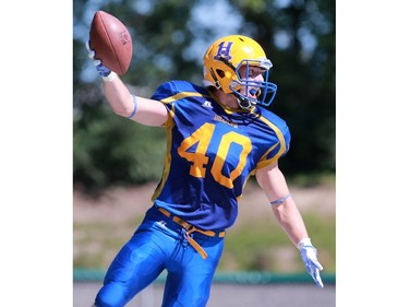 Saskatoon Hilltops' Adam Benkic celebrates his touchdown during the first half of their 2016 Prairie Football Conference season-opener against the Winnipeg Rifles at SMF Field on August 14, 2016.