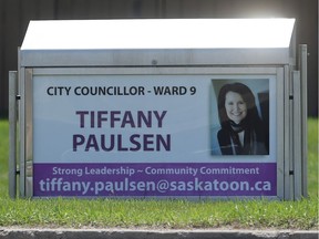 City Councillor Tiffany Paulsen is pictured on a bus stop sign rental at McKercher and 8th Street in Saskatoon on May 3, 2016. (Michelle Berg / Saskatoon StarPhoenix)