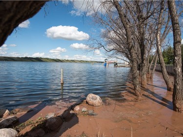 A playground structure sits underwater in Manitou Beach, SK on Friday, August 5, 2016.