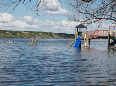 A playground structure sits underwater in Manitou Beach, SK on Friday, August 5, 2016.