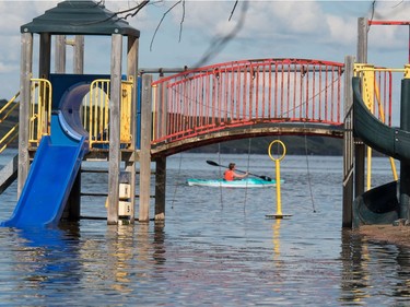 A playground structure sits underwater in Manitou Beach, SK on Friday, August 5, 2016.