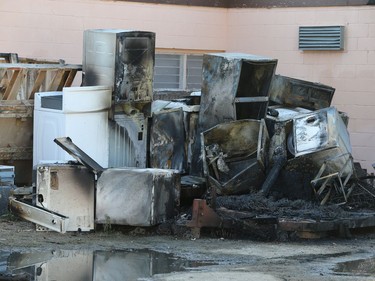 A fire behind a business at 16th Street West and Avenue H did damage to appliances stacked in the alley, August 22/2016.