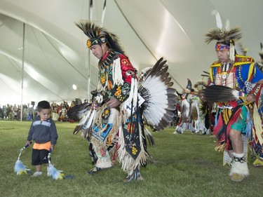 Dancers, dignitaries and delegates young and old participate in the Grand Entry for Wanuskewin Days Cultural Celebration and Powwow, August 23, 2016, in conjunction with the World Indigenous Business Forum at Wanuskewin Heritage Park.