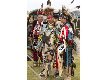 Dancers, dignitaries and delegates participate in the Grand Entry for Wanuskewin Days Cultural Celebration and Powwow, August 23, 2016, in conjunction with the World Indigenous Business Forum at Wanuskewin Heritage Park.