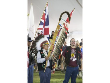 Dancers, dignitaries and delegates participate in the Grand Entry for Wanuskewin Days Cultural Celebration and Powwow, August 23, 2016, in conjunction with the World Indigenous Business Forum at Wanuskewin Heritage Park.