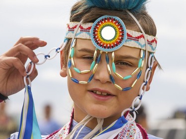 Kole Poochay of Yellowquill First Nation is  ready for the Grand Entry on day two of Wanuskewin Days Cultural Celebration and Powwow at Wanuskewin Heritage Park, August 24, 2016.