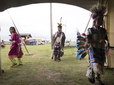 Yooung dancers get ready for the Grand Entry on day two of Wanuskewin Days Cultural Celebration and Powwow at Wanuskewin Heritage Park, August 24, 2016.