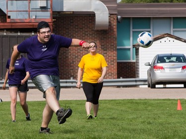 Participants take part in a game of soccer during Motionball Marathon of Sport Saskatoon at Aden Bowman in Saskatoon, SK on Saturday, August 27, 2016.