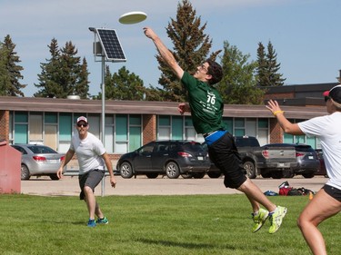 Participants take part in an game of ultimate frisbee during Motionball Marathon of Sport Saskatoon at Aden Bowman, August 27, 2016.