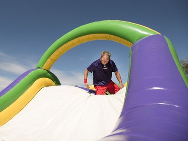 Participants take part in an obstacle course during Motionball Marathon of Sport Saskatoon at Aden Bowman in Saskatoon, SK on Saturday, August 27, 2016.