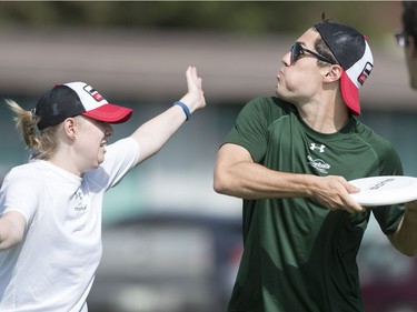 Participants take part in a ultimate frisbee game during Motionball Marathon of Sport Saskatoon at Aden Bowman in Saskatoon, SK on Saturday, August 27, 2016.