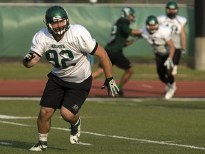 Defensive lineman Donovan Dale goes through the paces during practice at Griffiths Stadium on Wednesday.