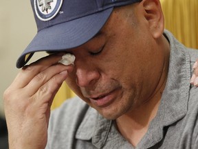 Norway House resident Leon Swanson weeps at a press conference in Winnipeg, Friday, August 26, 2016. Swanson and David Tait Jr. were switched at birth in 1975 when their mothers gave birth at Norway House Indian Hospital. A recent DNA test revealed that the two men from Norway House Cree Nation in northern Manitoba were likely raised by each other's families. This is the second time such an incident occurred in 1975.