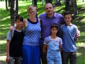 The Pankov family ministering in Siberia.  From left, Losha, Tonia, Alexey and Dmitry with Alyona in front. Submitted Photo