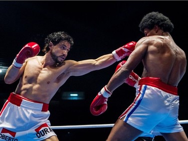 Edgar Ramirez (L) and Usher Raymond star in "Hands of Stone."