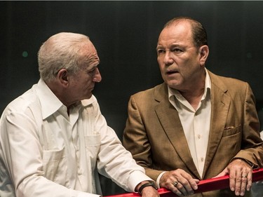 Robert De Niro (L) and Ruben Blades star in "Hands of Stone."