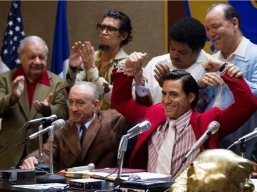 Robert De Niro (seated L) and Edgar Ramirez (seated R) star in "Hands of Stone."