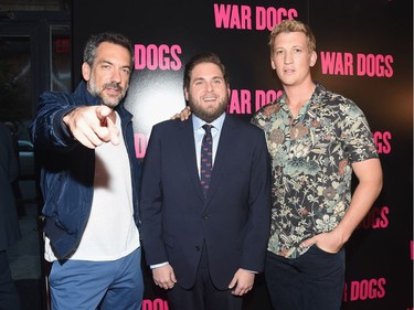 L-R: Director Todd Phillips and actors Jonah Hill and Miles Teller attend the "War Dogs" New York premiere at Metrograph on August 3, 2016 in New York City.