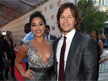 Actors Gina Rodriguez and Mark Wahlberg attend the "Deepwater Horizon" premiere during the 2016 Toronto International Film Festival at Roy Thomson Hall on September 13, 2016 in Toronto, Ontario.