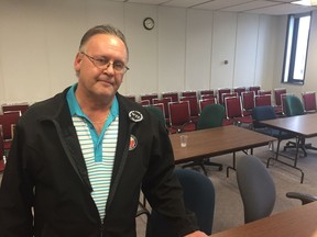 Amalgamated Transit Union 615 president Jim Yakubowski stands in a hearing room at the Sturdy Stone Building after a Labour Relations Board tribunal ruled in the union's favour to withdraw an application seeking a review of the essential services agreement between the City of Saskatoon and the ATU 615. (Morgan Modjeski/The Saskatoon StarPhoenix)