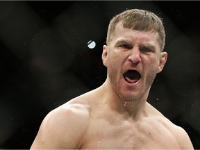 In this Jan. 2, 2016, file photo, Stipe Miocic celebrates after defeating Andrei Arlovski in a heavyweight mixed martial arts bout at UFC 195 in Las Vegas.