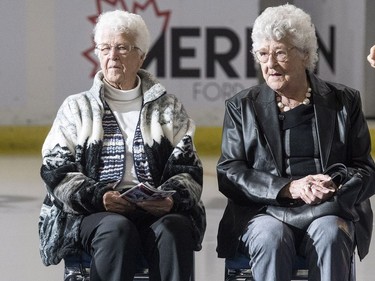 Gordie Howe's sisters Helen Cummine, left, and Vi Watson listen to speakers as part of Thank You, Mr. Hockey Day in Saskatoon at Sasktel Centre in Saskatoon, Sunday, September 25, 2016. Howe's remains where interred at a statue of him outside of the arena earlier today.