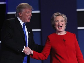 Republican presidential nominee Donald Trump and Democratic presidential nominee Hillary Clinton shake hands after the Presidential Debate at Hofstra University on September 26, 2016 in Hempstead, New York. The first of four debates for the 2016 Election, three Presidential and one Vice Presidential, is moderated by NBC's Lester Holt.