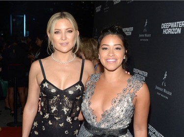 Actor Kate Hudson (L) and Gina Rodriguez attend the "Deepwater Horizon" premiere screening party presented by Johnnie Walker at The Addison Residence on September 13, 2016 in Toronto, Ontario.