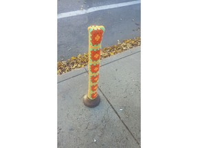 One of the parking meter posts covered by an anonymous "yarnbomber" at Fifth Avenue North and 23rd Street.