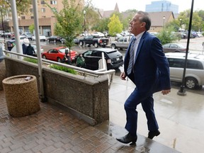 Former deputy premier  Don McMorris arrives at the Provincial Courthouse in Regina.