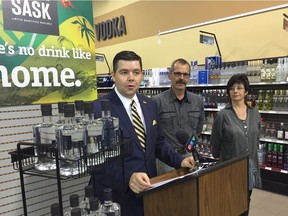 SLGA Minister Jeremy Harrison announces liberalization of the regulations on craft wineries and distilleries, watched by Barb and John Cote, who run the Black Fox Farm and Distillery near Saskatoon.