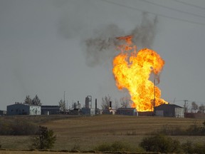 Remaining gas is burned off after explosion and fire at a gas pumping station owned by TransGas near Prud'homme, Sask., Saturday, October 11, 2014.