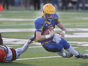 Jared Andreychuk is dragged down by an Okanagan Sun defender in the 2015 Canadian Bowl.