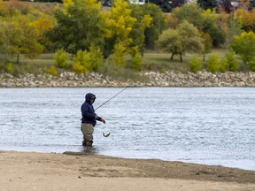 Cory Craig had the swimmers' beach on Spadina Crescent all to himself while doing a bit of fishing on Tuesday.