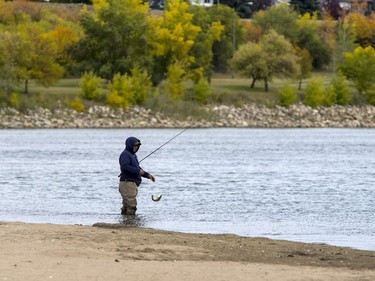 Cory Craig had the swimmers' beach on Spadina Crescent all to himself with the colder weather to do a bit of fishing,  September 12, 2016.