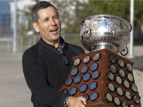 Saskatoon Blades president Steve Hogle totes the Art Ross Trophy earlier this week.