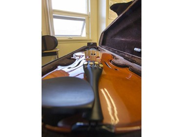 St. Michael Community School students are eager to learn to play the fiddle in the school's new program that was gifted with 25 new instruments by master fiddler Natalie MacMaster, September 27, 2016.