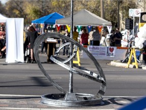 A celebration of artist Paul Reimer piece of art "Spheres of Confluence" set across the street to the Sutherland Hall in the 1100 block of Central Ave. on Sept. 30, 2016.