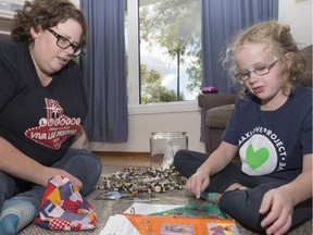 Tegan Lyster frequently looks through her scrap book her mom Jenn put together while Tegan was being treated for leukemia.