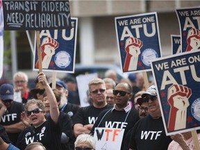 A crowd cheers during a speech at an a awareness rally for the Transit Union held at City Hall in Saskatoon, Saskatchewan on Saturday, September 10th, 2016.