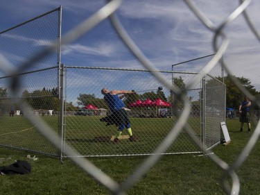 A Heavy Event competitor performs the hammer toss during the Saskatoon Highland Games in Saskatoon, September 10, 2016.