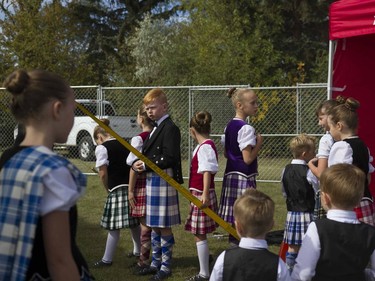 Dancers wait to perform a traditional sword dance during the Saskatoon Highland Games in Saskatoon, September 10, 2016.