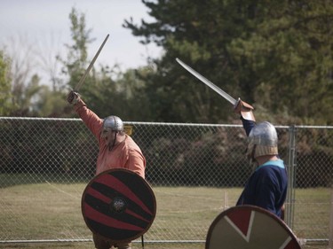 Performers from the Nordhere Vikings re-enact a battle scene during the Saskatoon Highland Games in Saskatoon, September 10, 2016.