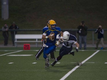 Jared Andreychuck runs the ball past a Regina Thunder player at SMF field in Saskatoon, September 10, 2016.