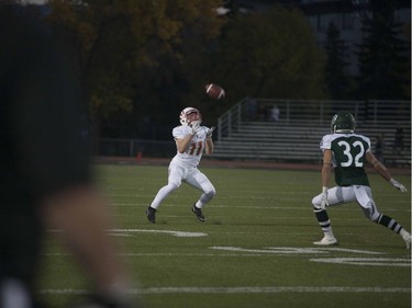 Calgary Dinos #11 Dallas Booth catches the ball after a kick by the Huskies at Griffiths Stadium in Saskatoon, September 16, 2016.