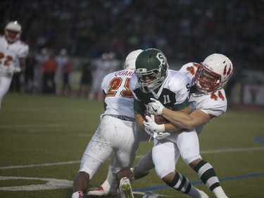 U of S Huskies #11 Chad Braun pushes the ball past the Calgary Dinos at Griffiths Stadium in Saskatoon, September 16, 2016.