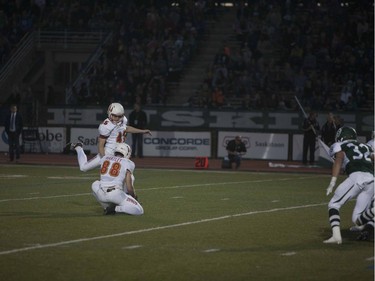 Calgary Dinos #45 Niko Difonte kicks the ball to the Huskies during the home opener at Griffiths Stadium in Saskatoon, September 16, 2016.