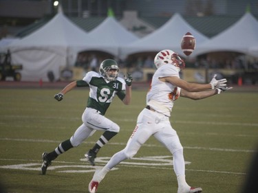 Calgary Dinos #89 Whitman Tomusiak catches the ball during the home opener  at Griffiths Stadium in Saskatoon, September 16, 2016.