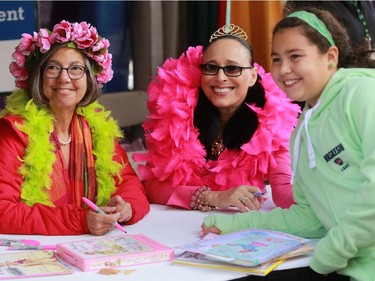 Fancy Nancy author Jane O'Connor and illustrator Robin Preiss Glasser pose with Anna Sheridan at the Word on the Street festival in Saskatoon on September 18, 2016.