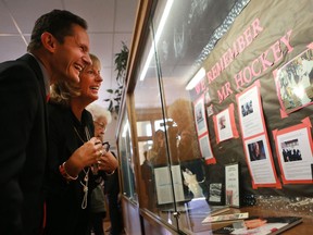 SASKATOON, SK - September 25, 2016 - Dr. Murray Howe and Cathy Howe look at a showcase of their father Gordie Howe at King George School, where Howe attended as a child in Saskatoon on September 25, 2016. (Michelle Berg / The StarPhoenix)